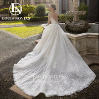 "Enchanting Mermaid Wedding Dress with Detachable Train & Long Sleeves - Elegant Lace Appliqué 2-in-1 Gown for the Perfect Bride"