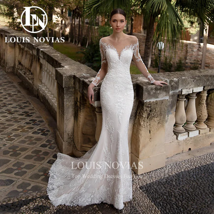 "Enchanting Mermaid Wedding Dress with Detachable Train & Long Sleeves - Elegant Lace Appliqué 2-in-1 Gown for the Perfect Bride"