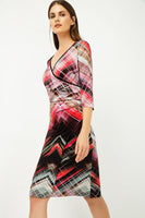 CONQUISTA FASHION - Original Print Jersey Faux Wrap Dress in Red